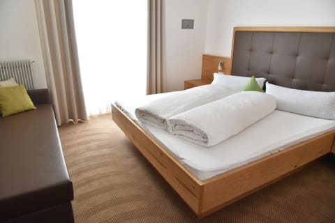 Triple Room | In-room safe, desk, laptop workspace, blackout drapes