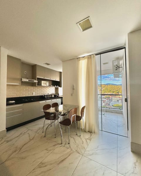 Deluxe Apartment | Private kitchen | Full-size fridge, microwave, oven, blender