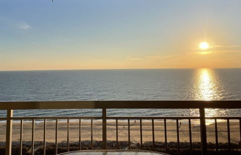 Enjoy beautiful Sunrises from the large balcony overlooking the ocean