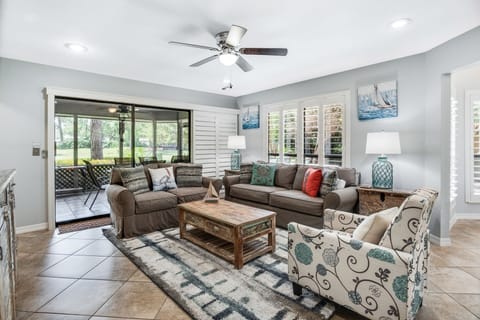 Living area opens to screened in porch