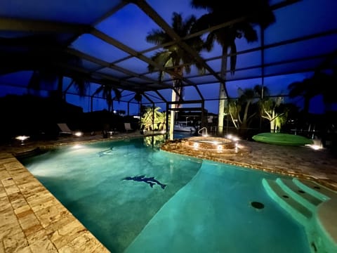 enjoy the pool area and hot tub at night