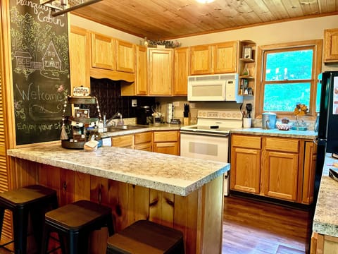 Small kitchen but we provide pots, pans, dishes, & all tools you need to dine in