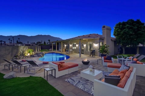 Backyard is perfect to entertain or relax by the pool