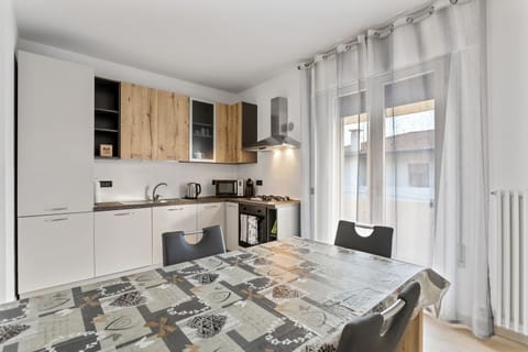 Apartment, 3 Bedrooms | Private kitchen | Full-size fridge, stovetop, electric kettle, cookware/dishes/utensils