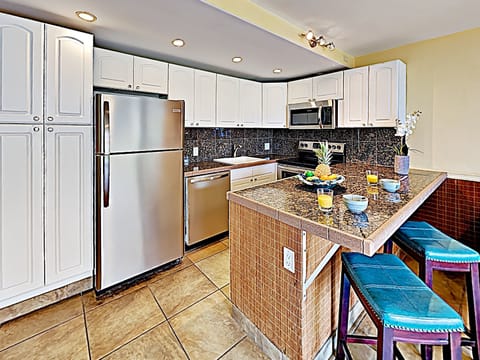 Kitchen - Beautifully remodeled kitchen with bar seating for two