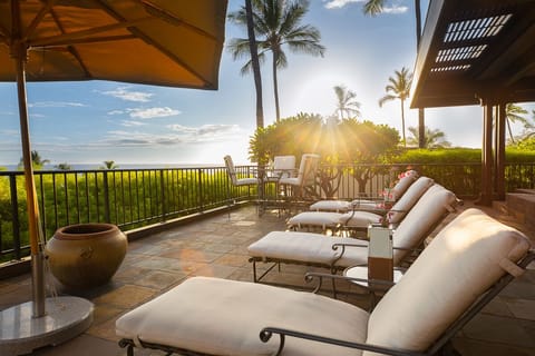 Soak up the Hawaiian sun on your private lanai with stunning coastal views—perfect for morning coffee or sunset lounging.