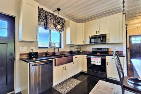 Kitchen Area looking at sink and stove