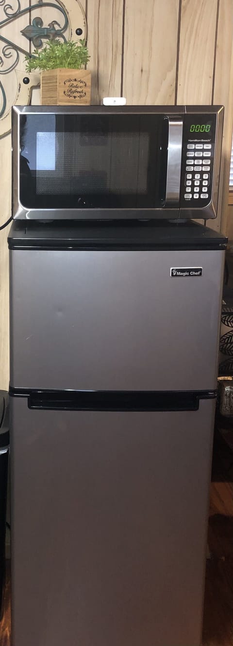 Mid sized refrigerator. Microwave 