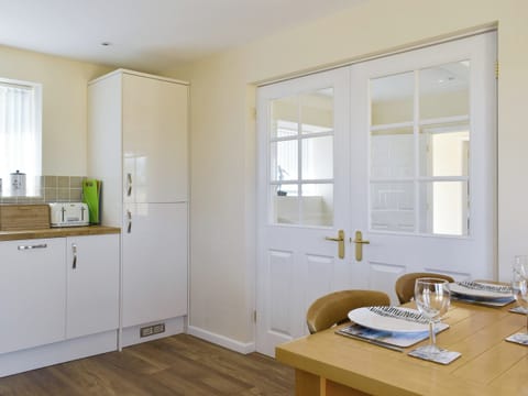 Convenient dining area within kitchen | Stars Cottage, Moreton, near Wareham