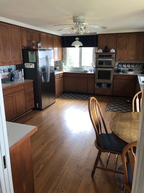 Large kitchen w/dining for 6. Pocket doors close it off if desired for quiet. 