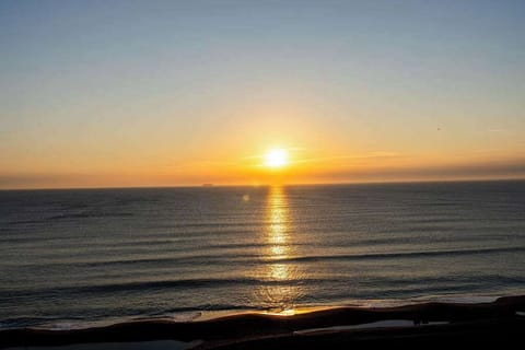 Sun Rising over the Ocean