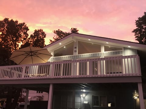 Furnished outdoor deck. There is NOT an umbrella on the deck area.