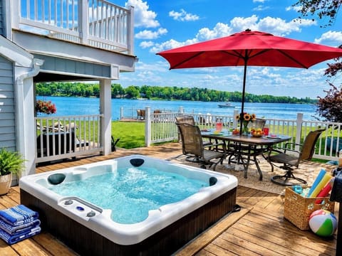 Relax lakeside in the hot tub, dine under the umbrella, and enjoy lake life!