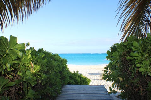 Beach nearby, white sand, sun loungers, beach umbrellas