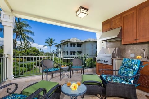Covered lanai comfortable seating and BBQ