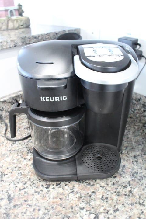 Keurig! It makes a pot of coffee or 1 cup 