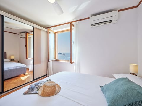 Apartment, Terrace, Sea View (2 Bedrooms) | 2 bedrooms, iron/ironing board, travel crib, WiFi (free)