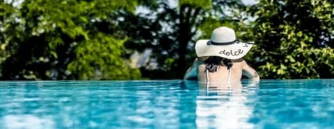 Indoor pool, seasonal outdoor pool, pool umbrellas, sun loungers