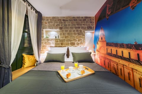 Standard Double Room | Minibar, in-room safe, desk, blackout drapes