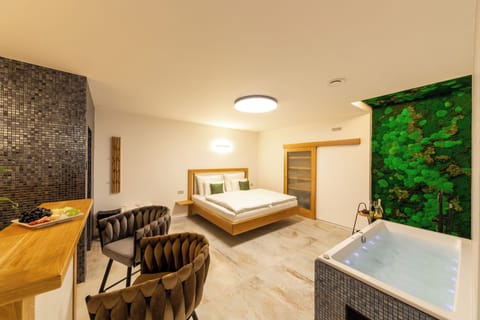 Deluxe Apartment | Premium bedding, minibar, in-room safe, blackout drapes