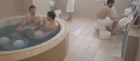 Capsule Room, Men Only | Bathroom | Combined shower/tub, jetted tub, hair dryer, slippers