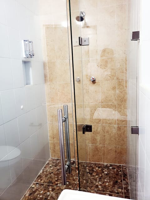 Shower, free toiletries, towels, soap