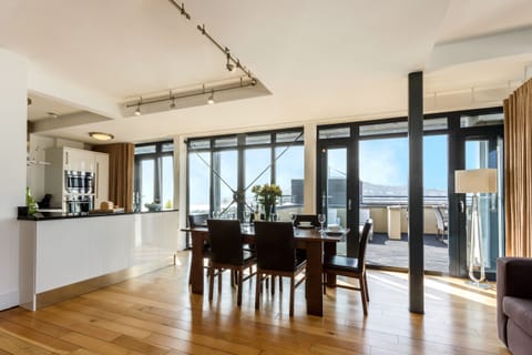 Penthouse Apartment (Penthouse 3) | Living area | 42-inch flat-screen TV with digital channels, TV, DVD player