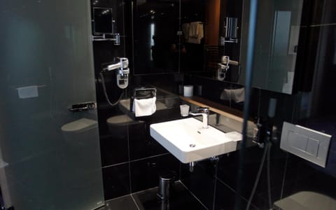 Designer toiletries, hair dryer, bathrobes, slippers