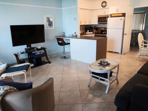 Comfort Condo, 1 Bedroom (Intracoastal View) | Living area | Flat-screen TV