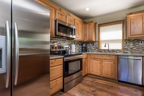Modern kitchen with stainless steel appliances