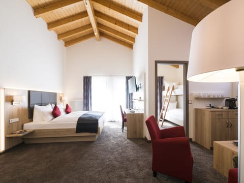 Junior Suite, 2 Bedrooms | In-room safe, desk, laptop workspace, blackout drapes