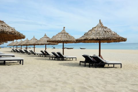 Private beach, white sand, sun loungers, beach umbrellas