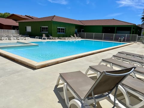 A short stroll from the petanque courts, the pool stretches out with room to swim laps.