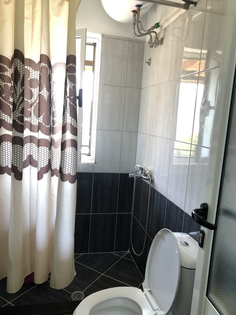 Family Room, Mountain View | Bathroom | Shower, hair dryer, slippers, towels