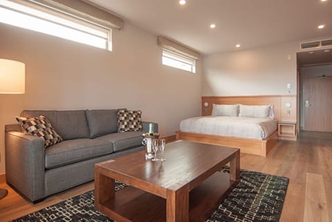 Premier Studio Suite, 1 King Bed, Harbor View | Desk, laptop workspace, iron/ironing board, free WiFi