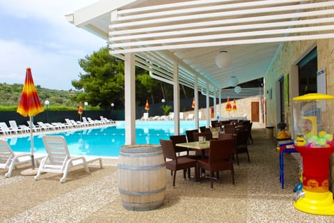 Seasonal outdoor pool, pool umbrellas, sun loungers