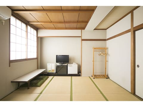 Japanese Style Room for 4 guests, Non-Smoking | Desk, WiFi (free), bed sheets