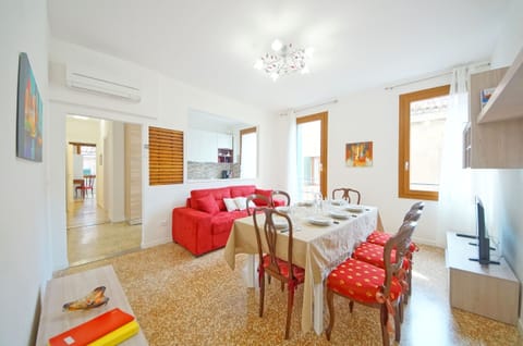 Apartment, 3 Bedrooms | Living area | Flat-screen TV