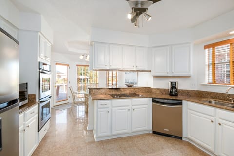 kitchen with Jennair cook top and double oven 