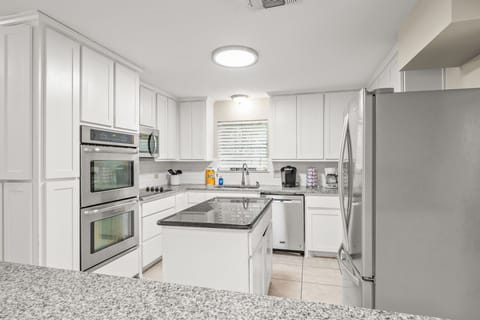 Your fully equipped kitchen with granite countertops.