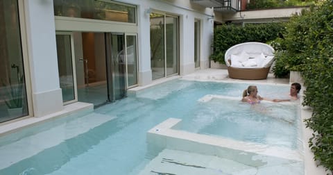 Outdoor pool, open 11:00 AM to 8:00 PM, sun loungers