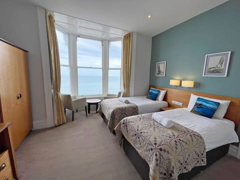 Twin Room, Sea Facing | Desk, iron/ironing board, free WiFi, bed sheets
