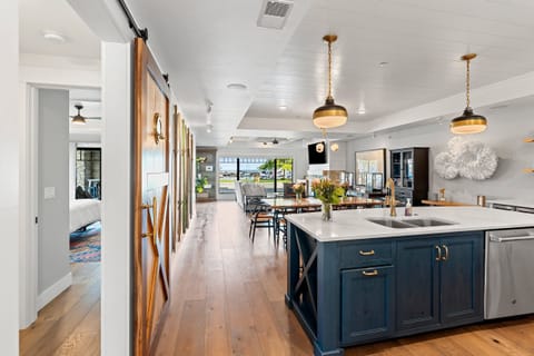 Open concept allows guests to enjoy the kitchen, living room, and marina views!
