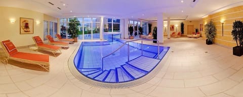 Indoor pool, outdoor pool, open 8:00 AM to 8:00 PM, pool umbrellas