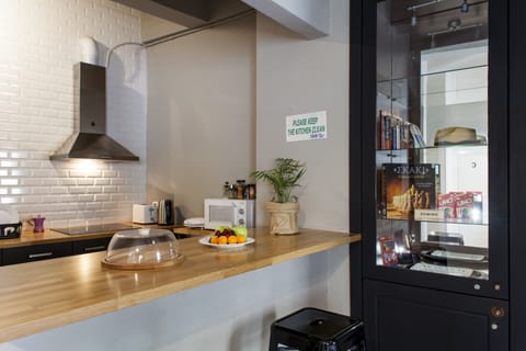 Fridge, microwave, stovetop, cookware/dishes/utensils