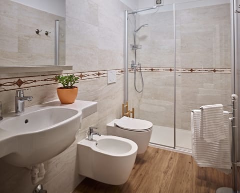 Double or Twin Room, Private Bathroom (External) | Bathroom | Shower, hair dryer, bidet, towels