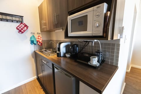 Luxury Studio Suite, Balcony, Sea View | Private kitchenette | Fridge, microwave, coffee/tea maker, electric kettle