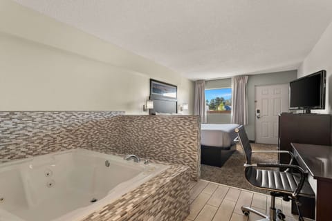 Pillowtop beds, laptop workspace, blackout drapes, iron/ironing board