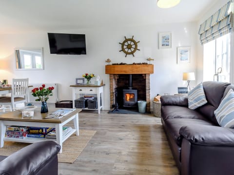 Welcoming living area with wood burner | The Bolthole - The Bay, Filey, near Scarborough