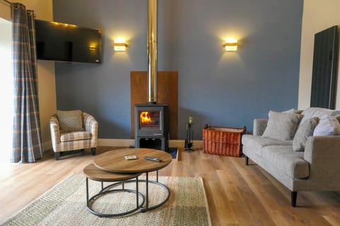 Cosy room with wood burning stove.
